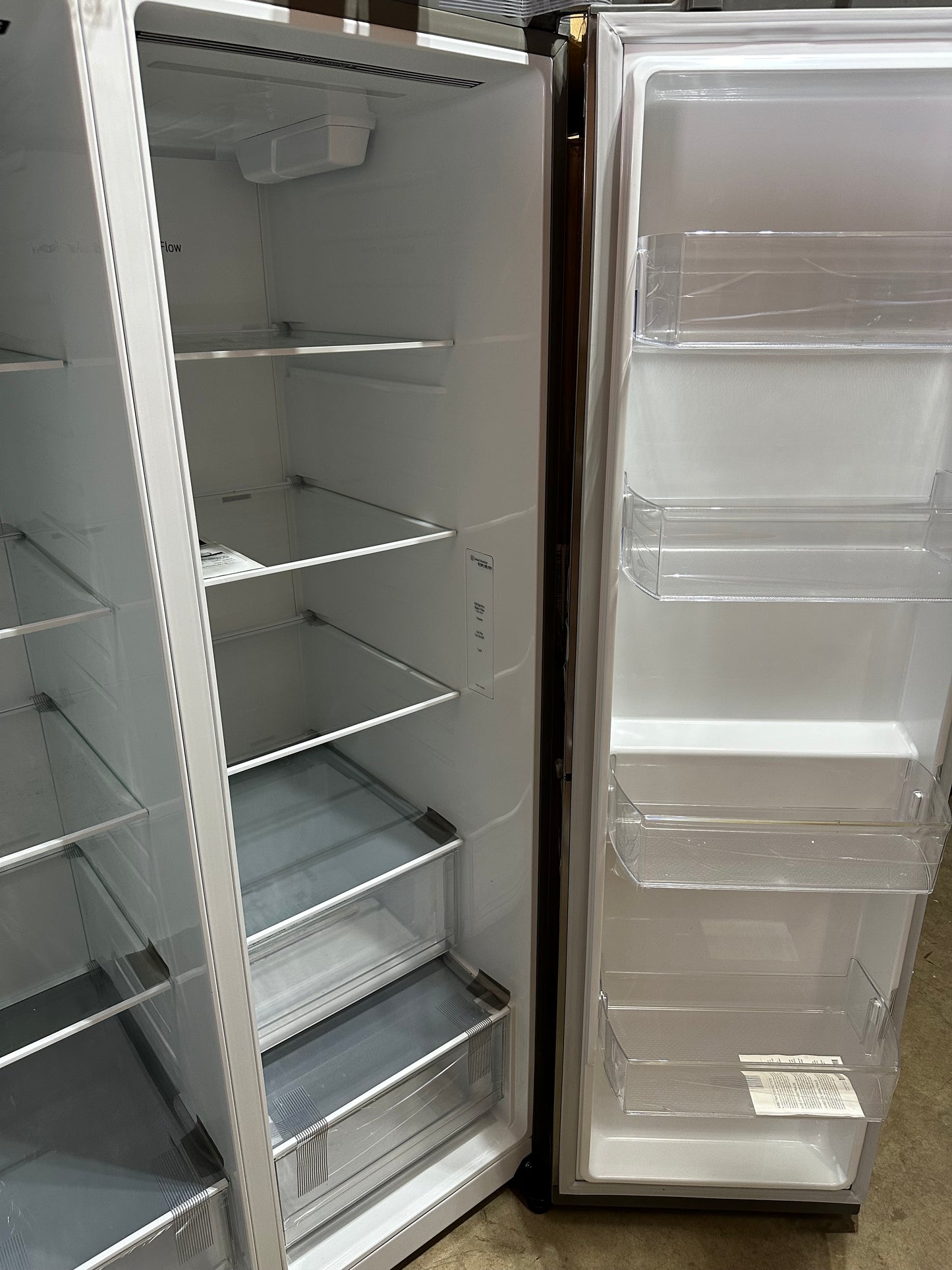 LG 27.2-cu ft Side-by-Side Refrigerator with Ice Maker, Water and Ice Dispenser (Stainless Steel Look— Platinum Silver)