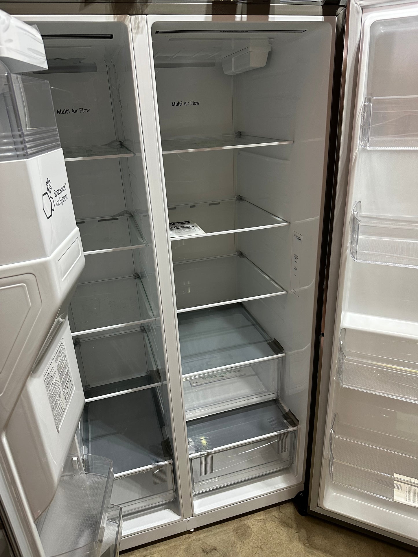 LG 27.2-cu ft Side-by-Side Refrigerator with Ice Maker, Water and Ice Dispenser (Stainless Steel Look— Platinum Silver)